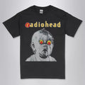 Radiohead Pablo Honey alternative rock band t-shirt  with DTG printed  album art featuring a baby's head with red and yellow eyes on a black unisex crew neck tee. High-quality graphic tee  for music memorabilia  collectors.
